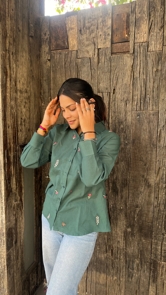 Model wearing forest green Green Meadow Shirt with floral embroidery by Urrva