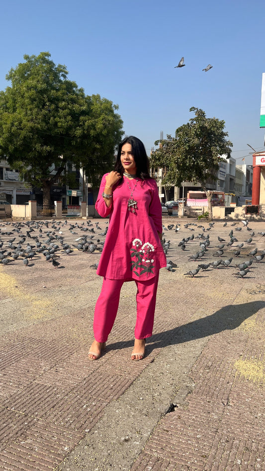 Model wearing Urrva's Boho Blossom Twinset – magenta floral cotton co-ord set