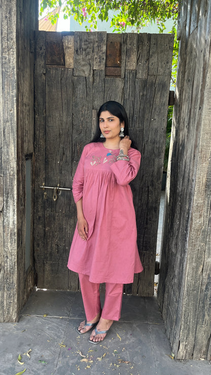 Model wearing Urrva's Dusty Rose Charm Co-ord – pink embroidered cotton kurta set