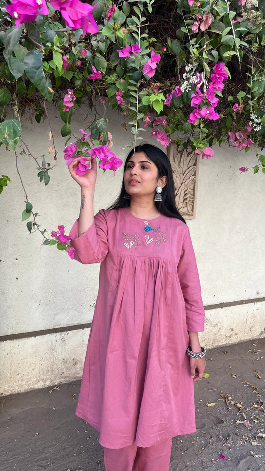 Model wearing Urrva's Dusty Rose Charm Co-ord – pink embroidered cotton kurta set