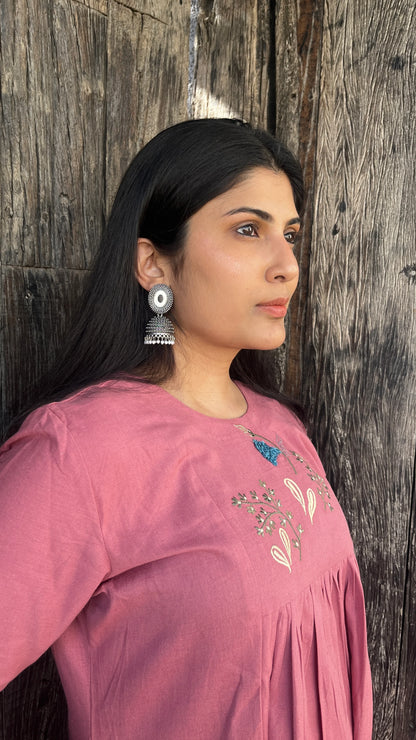 Model wearing Urrva's Dusty Rose Charm Co-ord – pink embroidered cotton kurta set