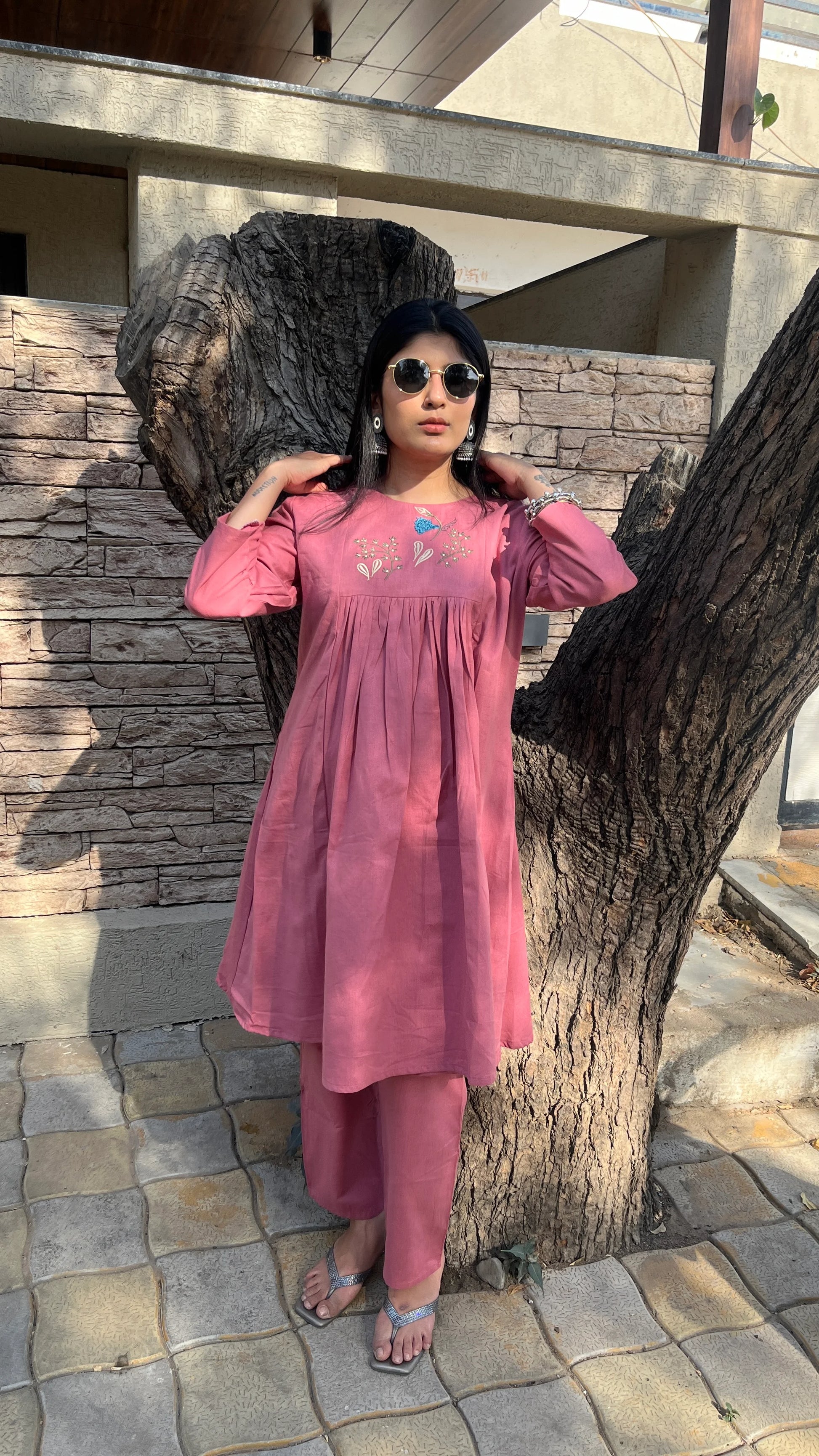 Model wearing Urrva's Dusty Rose Charm Co-ord – pink embroidered cotton kurta set