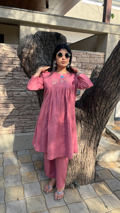 Model wearing Urrva's Dusty Rose Charm Co-ord – pink embroidered cotton kurta set