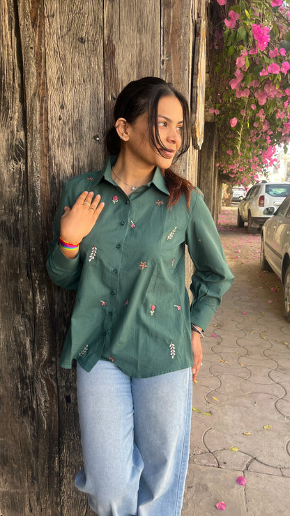 Model wearing forest green Green Meadow Shirt with floral embroidery by Urrva