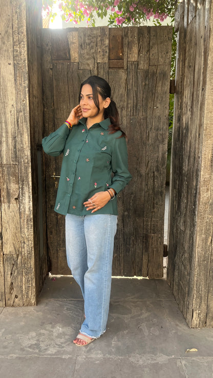 Model wearing forest green Green Meadow Shirt with floral embroidery by Urrva