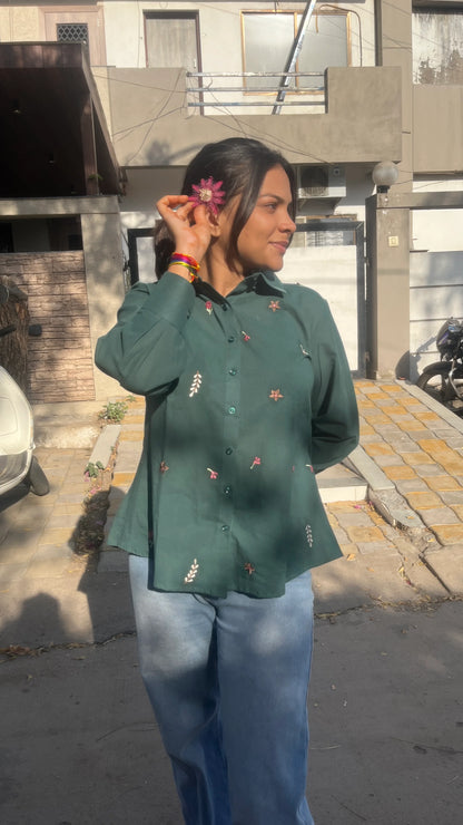 Model wearing forest green Green Meadow Shirt with floral embroidery by Urrva