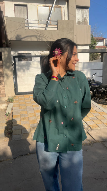 Model wearing forest green Green Meadow Shirt with floral embroidery by Urrva