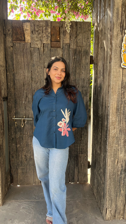 Urrva Indigo Flora shirt with floral patchwork worn by model