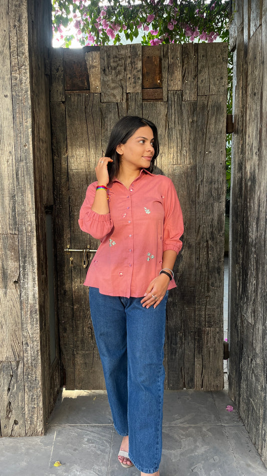 Model wearing Rosé Bloom Shirt in pink cotton with floral embroidery by Urrva
