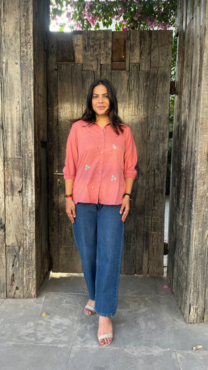 Model wearing Rosé Bloom Shirt in pink cotton with floral embroidery by Urrva