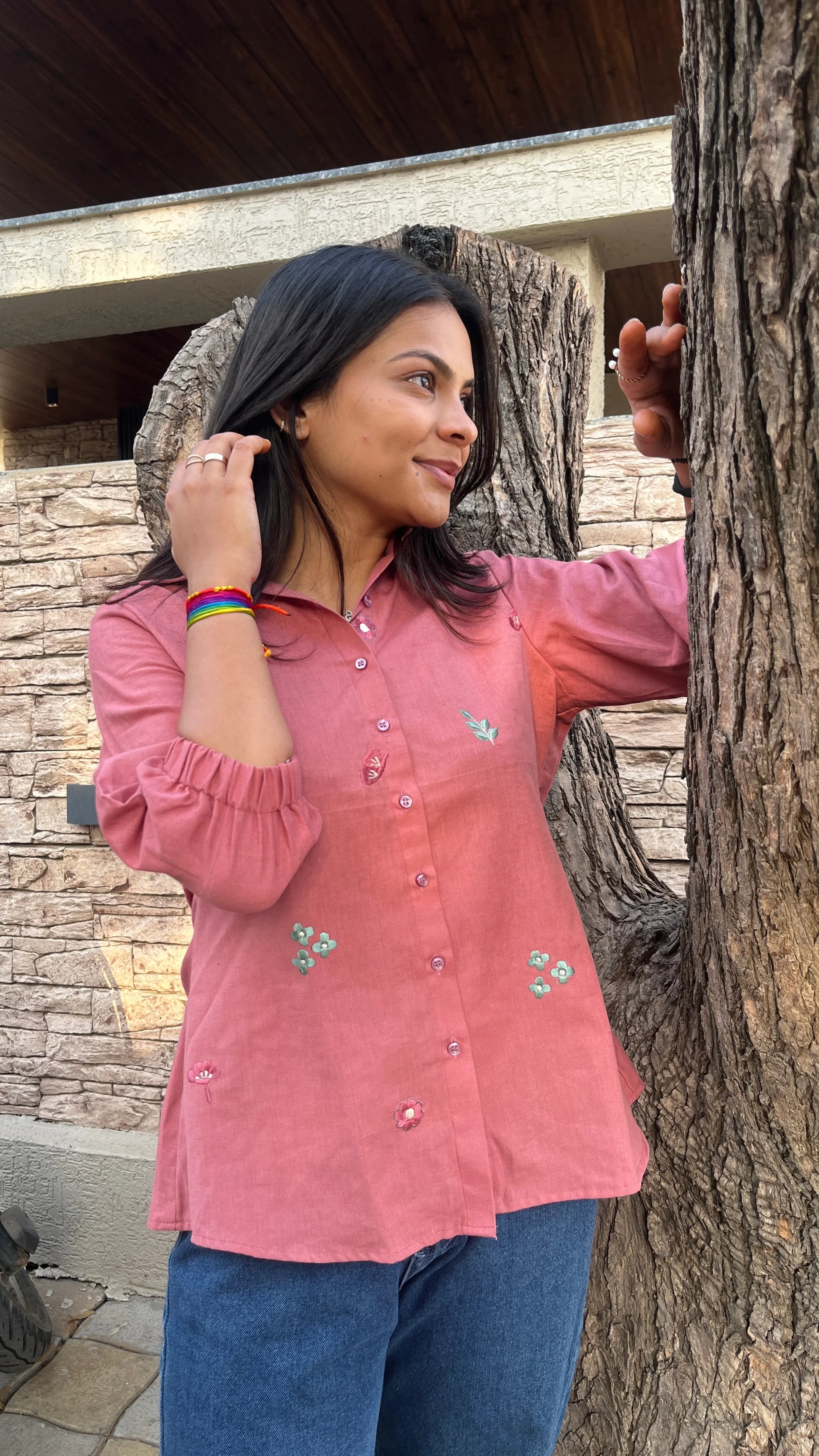 Model wearing Rosé Bloom Shirt in pink cotton with floral embroidery by Urrva